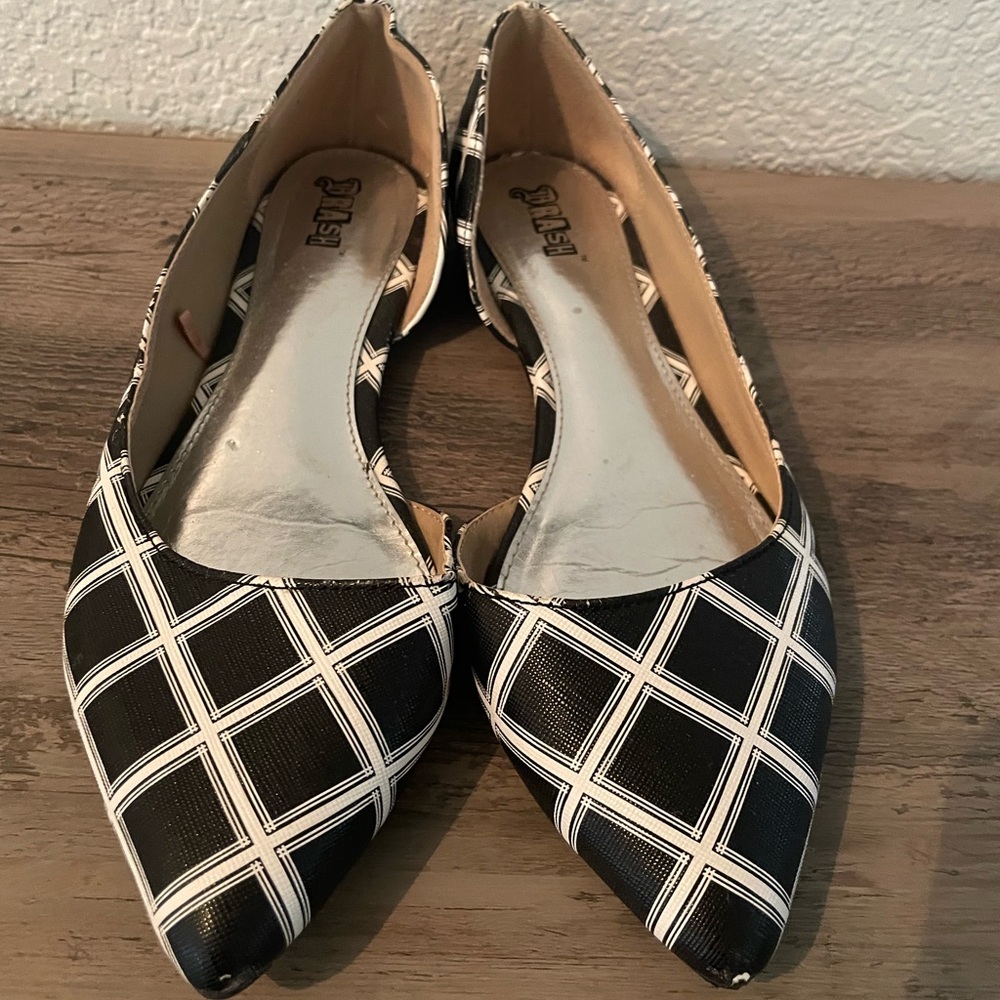 Brash black and white flats.  8.5